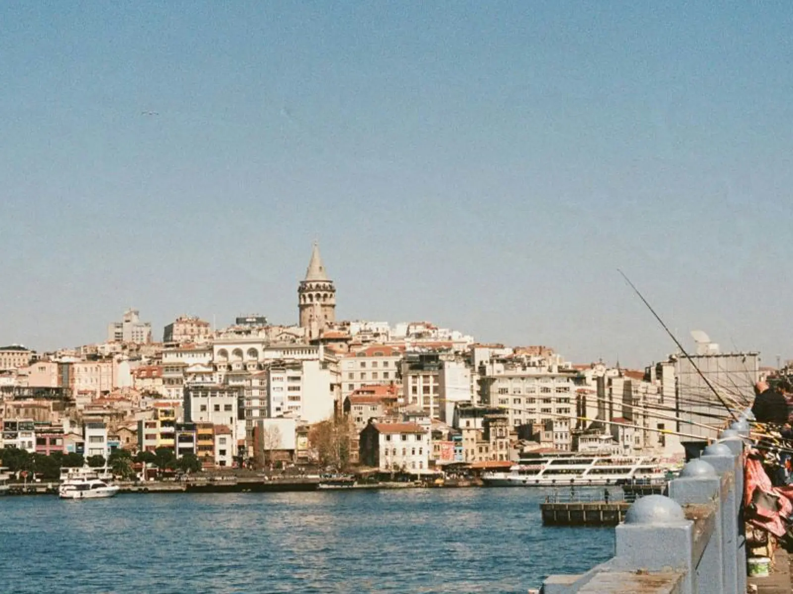 Galata Bridge and the Golden Horn with Galata Tower in the distance
